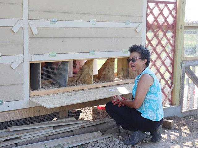 Farmer Patricia Pinto raises chickens on her farm north of Omaha. Pinto is a graduate of the first group of Conservation Fellows hosted by the Center for Rural Affairs. (Photo courtesy of Center for Rural Affairs)