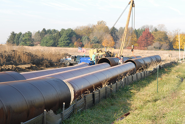 Some oil pipeline projects have drawn heavy local opposition in recent years. Now, a couple of major projects are proposed to collect carbon dioxide emissions from ethanol plants and pipe the CO2 to sites where the carbon dioxide will be sunk into the ground. The projects could be lucrative for ethanol plants because of low-carbon fuel credits and a federal tax credit. (DTN file photo by Rob Lagerstrom)