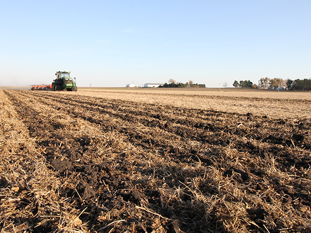 Reid Thompson of Colfax, Illinois, incorporates dry fertilizer as he strip-tills a field late last fall. (DTN photo by Pamela Smith)
