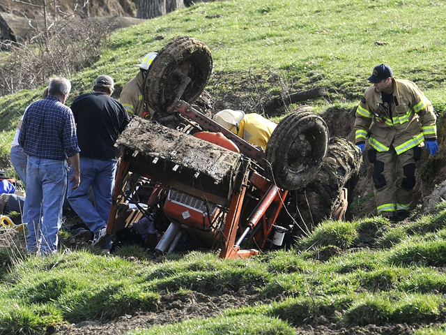 Discussing potential safety hazards and how to handle them before they actually happen can go a long way to prevent accidents like this rollover incident. (DTN file photo)