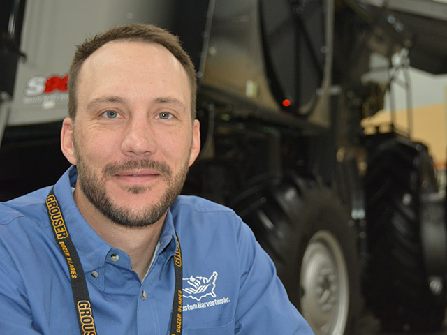 Ryan Haffner, who runs a custom-harvest business in western Kansas, said at the U.S. Custom Harvesters Inc. annual meeting Friday he hoped it would be easier to bring in H-2A guest workers in 2021 than it was last year. But the Biden administration on Monday issued new travel bans that will affect workers from South Africa, Europe, the United Kingdom and Brazil. (DTN photo by Chris Clayton)