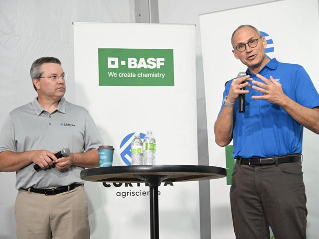 Sam Eathington (left), Corteva Agriscience executive vice president, chief technology and digital officer, and Peter Eckes, BASF Agricultural Solutions president of R&amp;D and regulatory, announced on Aug. 30 a formal collaboration between the two companies to develop future herbicide-tolerant soybeans and complementing herbicides. (DTN photo by Matthew Wilde)