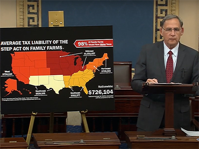 Sen. John Boozman, R-Ark., speaking on the U.S. Senate floor Wednesday, with a map showing projected increases in tax liability under plans to eliminate stepped-up basis for farms and ranches and raise capital-gains rates for inherited assets. The map was based on an analysis done by Texas A and M Agricultural and Food Policy Center. (Image courtesy of Senate Agriculture Committee minority staff)