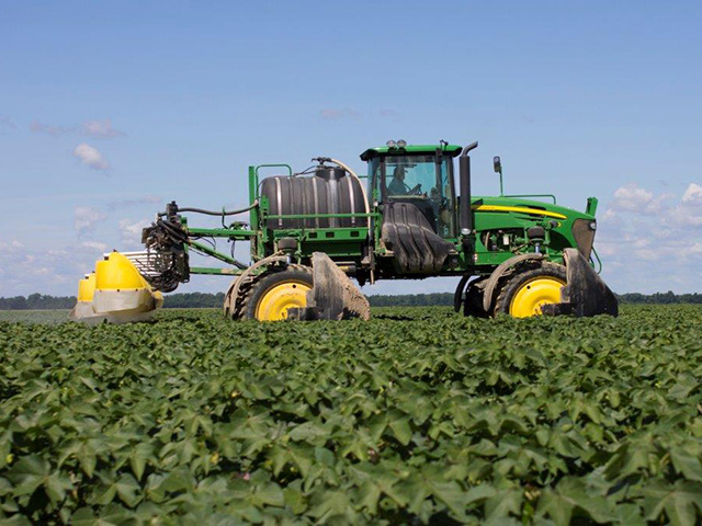 Sprayers outfitted with broadcast hoods, like this one with a Redball SPK645 conversion kit, may become more popular this season as soybean growers seek to minimize herbicide drift. (Photo courtesy of Willmar Fabrication)