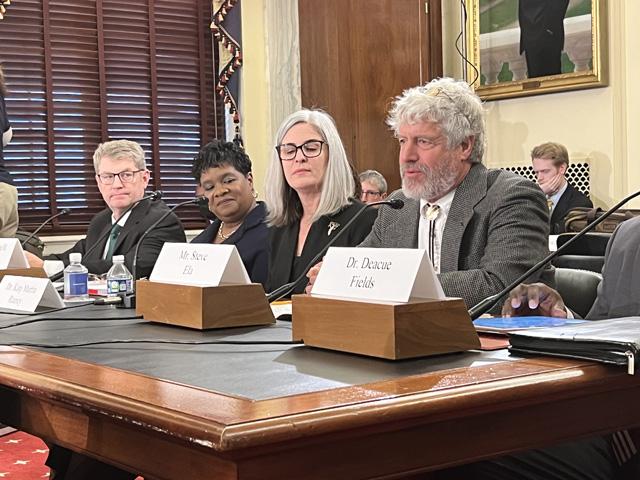 Steve Ela, an organic orchard farmer from Colorado, on the right, testifies at a U.S. Senate hearing on Tuesday. Experts who testified, including USDA&#039;s undersecretary for research, highlighted that demand for research and science innovation outstrips the funding provided in the farm bill. (DTN photo by Chris Clayton)