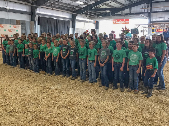 Washington County, Nebraska, 4-H youth took a group photo before the large animal auction at the end of their 2021 county fair on Aug. 4. (DTN photo by Russ Quinn)