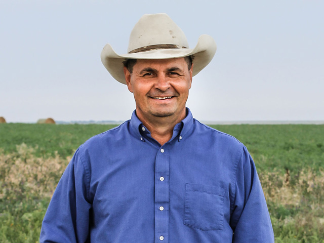 Zach Ducheneaux, who became the USDA Farm Service Agency administrator in late February, is a rancher on the Cheyenne River Sioux Reservation in South Dakota. He said the agency continues to look at current needs for aid as the Biden administration reviews the CFAP-AA program, and draft the rules for aid under new funding packages that have passed Congress.  (Photo by Dawnee Lebeau for the Federal Reserve Bank of Minneapolis)